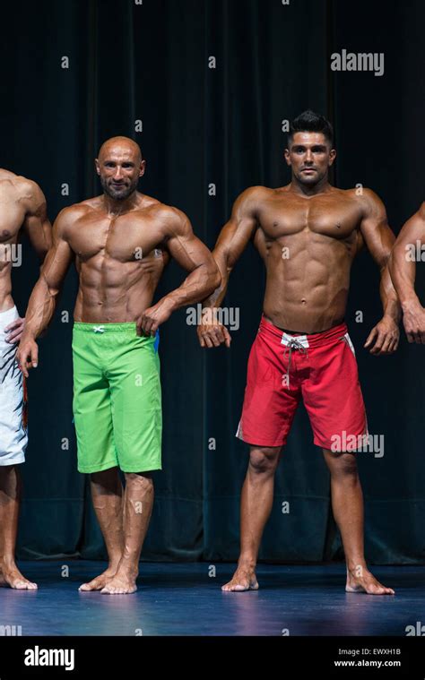 mens physique posing   bodybuilding competition stock photo alamy