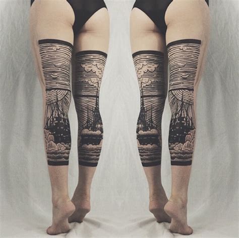 stunning diptych tattoos form landscapes across the backs of legs