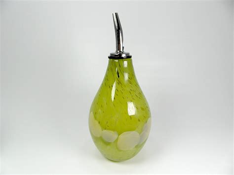 hand blown glass olive oil dispenser in warm by missmacglass