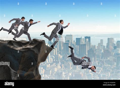 business people falling   cliff stock photo  alamy