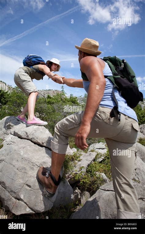 helping   man  woman high resolution stock photography