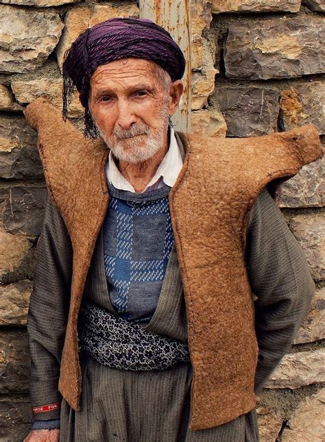 kurdish man from iran in traditional attire photo by