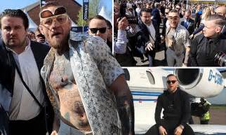 conor mcgregor flouts dress code at grand national daily
