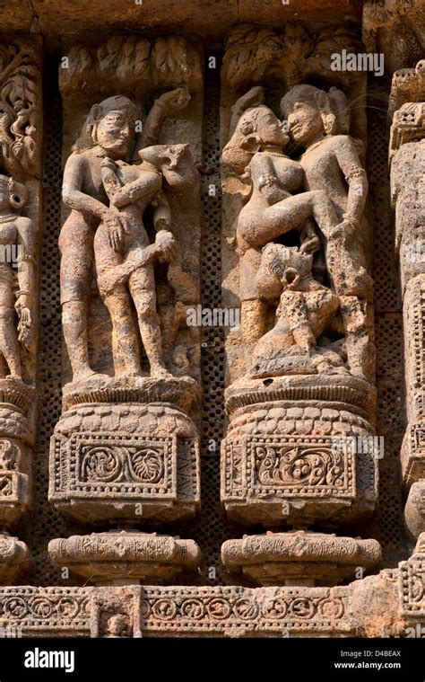 erotic sculptures adorn the façade of the sun temple at konark near