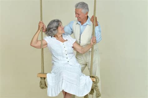 Elderly Couple On Swing Stock Image Image Of Beautiful 56895245