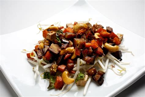 Stir Fry Of Eggplant Sweet Potato And Cashew Nuts With Tofu The