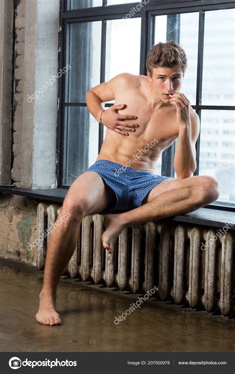 Handsome Brutall Cute Russian Male Model Underwear Sitting