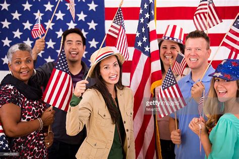 Multiethnic Group American People At Political Rally Usa Flags Voting