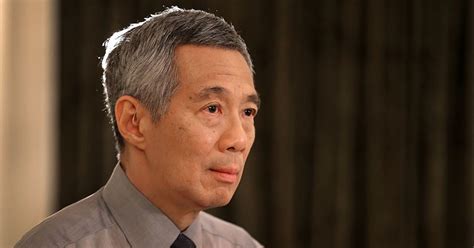 singapore pm    avoid legal action  siblings world