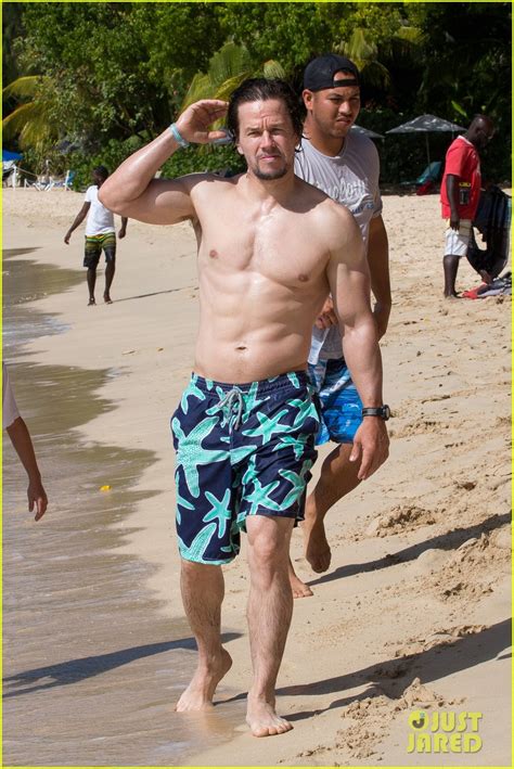 celeb photos mark wahlberg serving muscles shirtless on