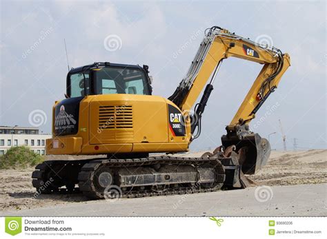 caterpillar  mini hydraulic excavator editorial photo image