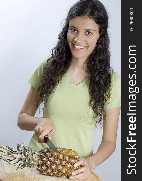 girl cutting pineapple free stock images and photos 2660800