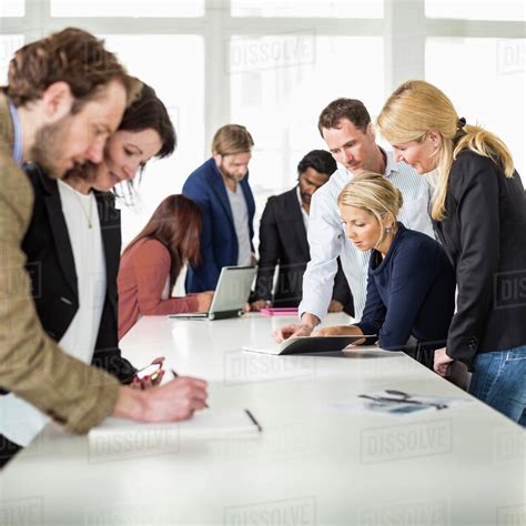 group  business people working   desk  office stock photo dissolve