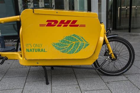 dhl electrical delivery bicycle  amsterdam  netherlands  editorial photo image
