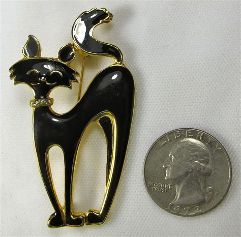 vintage black enamel cat brooch with cartoon styling pzbaubles new
