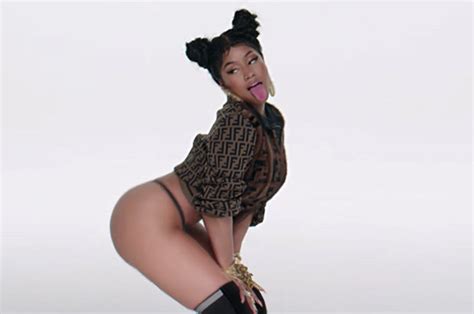 nicki minaj exposes logic defying booty in world s smallest thong