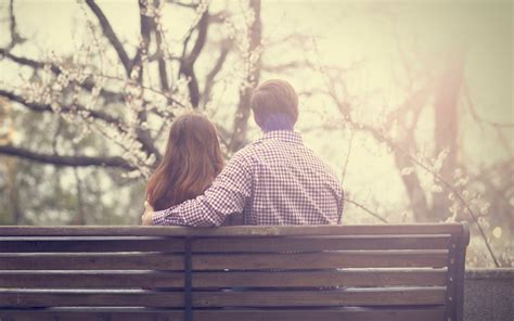 couple sitting bench wallpaper