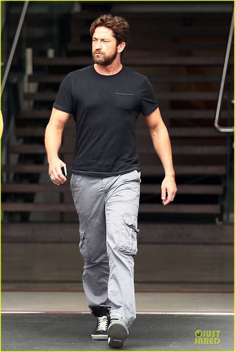 gerard butler oozes major sex appeal with tight black t