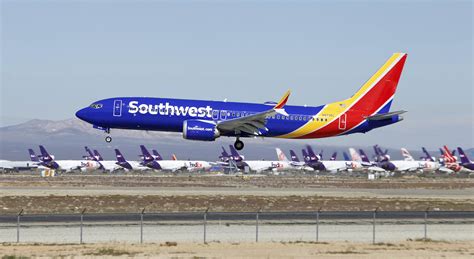 southwest removes  max   flight schedule  august