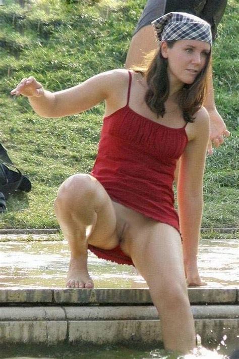 pantyless girl is cooling down in the water upskirt sorted by position luscious