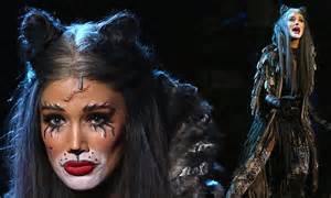 delta goodrem undergoes extreme feline makeover for her role in cats
