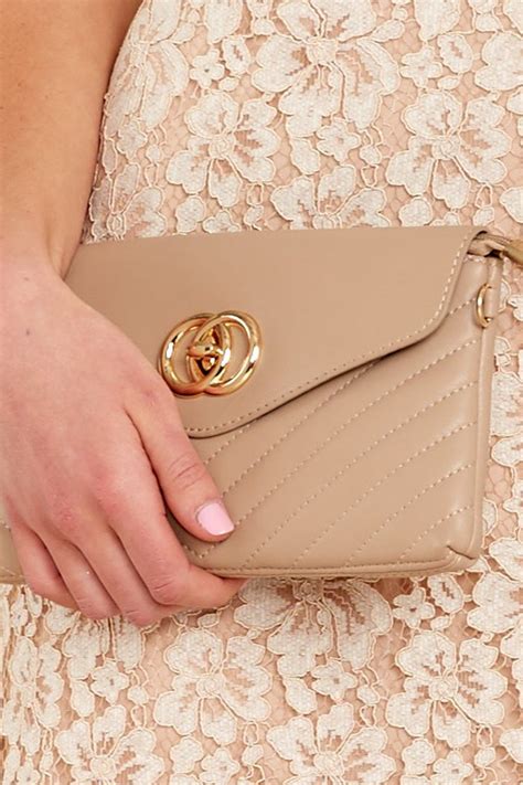 luxurious beige vegan leather clutch quilted clutch bag  red dress boutique
