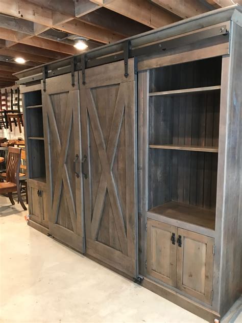 weathered gray  style barn door entertainment cabinet