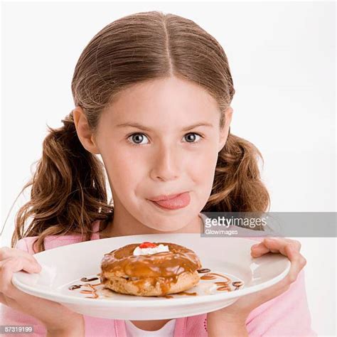 Girl Licking Plate Photos And Premium High Res Pictures Getty Images