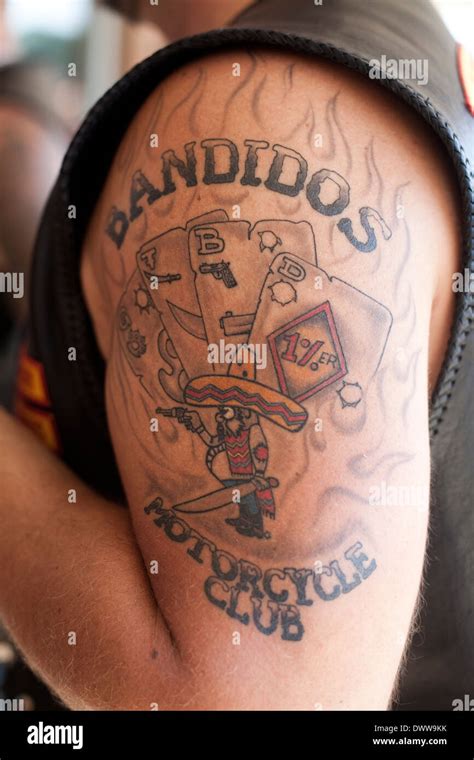 bandidos motorcycle club tattoo   biker arm stock photo