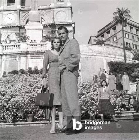 ursula andress  john derek italy  bw photo