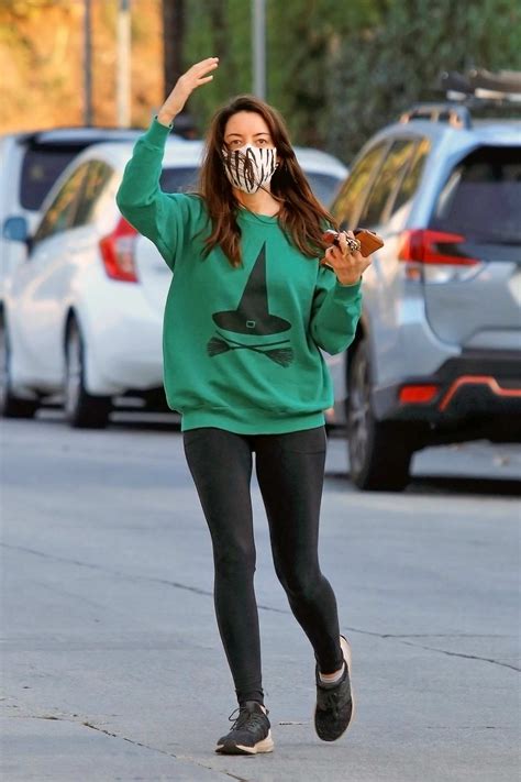 Aubrey Plaza Dons A Green Sweatshirt And Black Leggings For An Outing