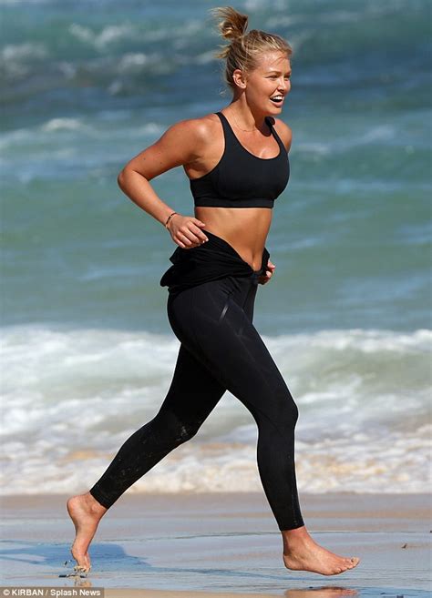 Lara Bingle Shows Off Her Toned And Tanned Abs As She Keeps Fit By