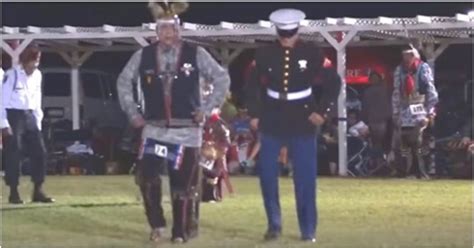 Native Americans Perform Tribal Dance When Marine Walks Up