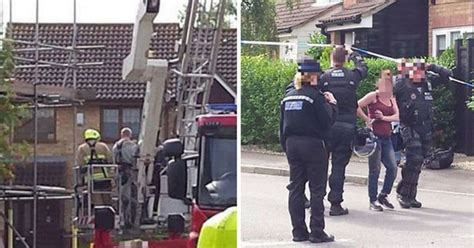 Woman ‘throws Tiles Off Roof In Eight Hour Siege As Cops Warn People