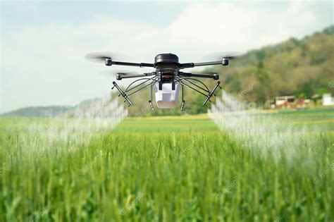 premium photo drone spraying pesticide  wheat field