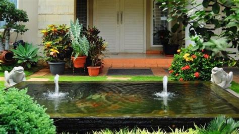 taman minimalis belakang rumah  kolam ikan situs properti indonesia