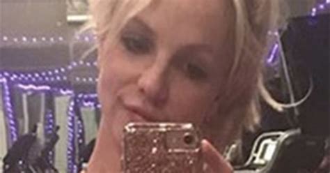 Britney Spears Crams Cleavage While Rocking Microscopic