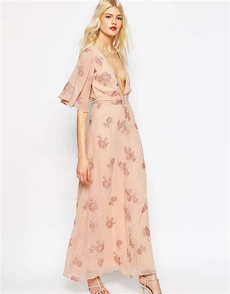 Asos Asos Flutter Sleeve Maxi Dress With Pretty Florals At Asos