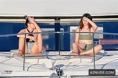 selena gomez stuns as she soaks up the sun in green bikini aboard