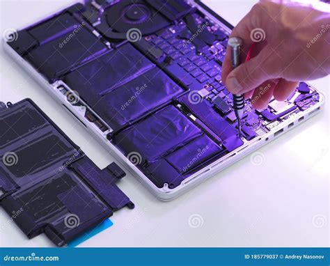 replacing  battery       laptop stock image image  care closeup