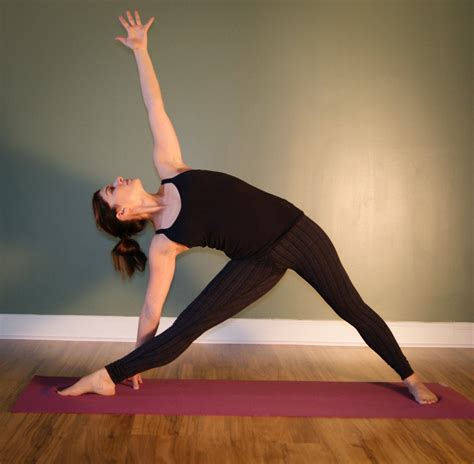 practicing yoga  home   day yoga challenge caloriebee