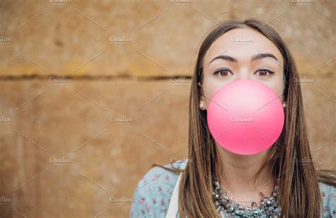 Young Girl Blowing Pink Bubble Gum High Quality People Images