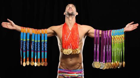 swimmer michael phelps poses    olympic medals ascom