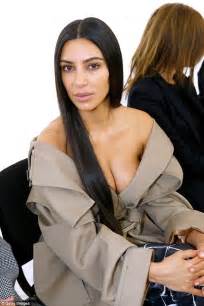 Braless Kim Kardashian In Off The Shoulder Trench Coat At Balenciaga