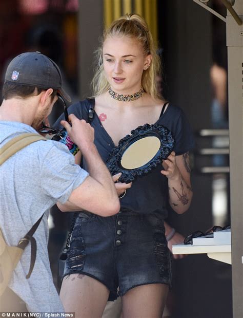 Sophie Turner Shows Off Her Long Legs In Tiny Denim