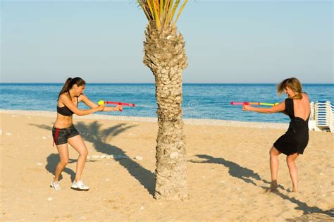 beach fun stock photo image  soak playful beautiful