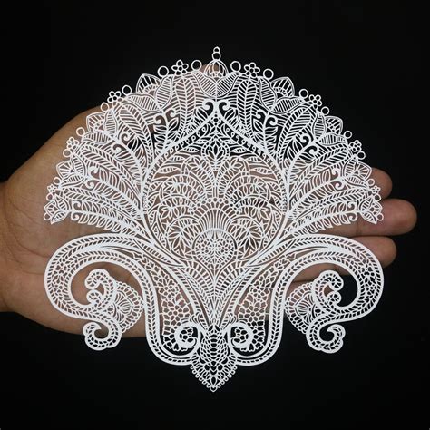 create intricate paper art  paisley cutout     days
