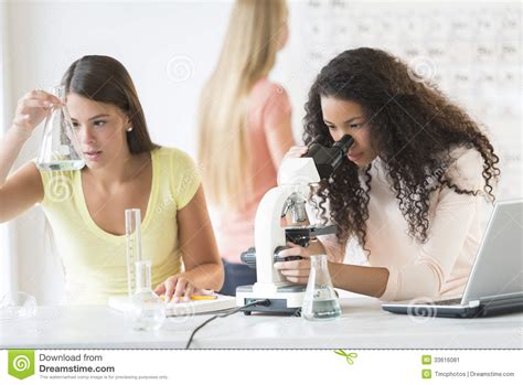 teenage girls experimenting in chemistry class stock image image 33616081