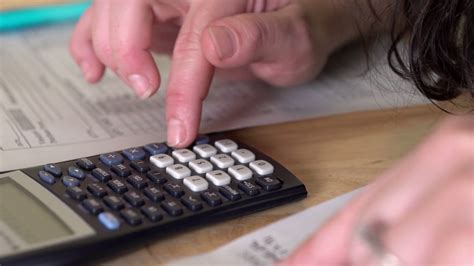 number budgeted  bills  calculator stock video footage storyblocks