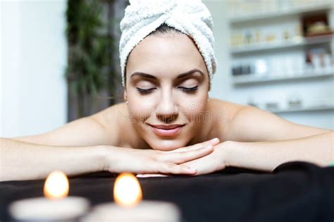 pretty young woman enjoying massage  beauty spa stock photo image